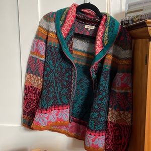 Ivko sweater. Multi-colored with patterns. It buttons up.